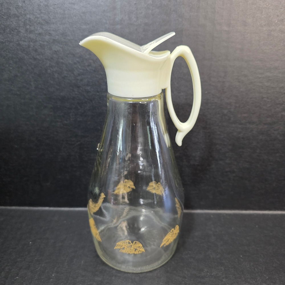 Log Cabin Syrup Pitcher Vintage Clear Glass Gold Eagle White Flip Lid 8.5in